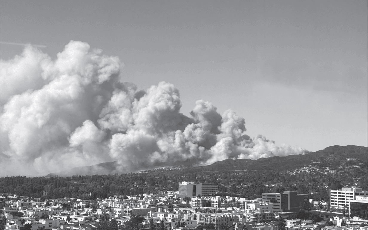 A view of billowing smoke from the horrific Palisades Fire in Los Angeles that killed 12 people, according to the official count, and destroyed almost 7000 buildings and 23,000 acres during January 2025. The Palisades Fire, along with the Eaton Fire, were some of the worst fires in Los Angeles County history and are expected to majorly impact human health and the surrounding environment for many years to come.